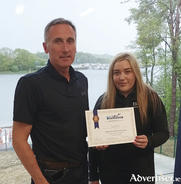 Athlone River Safety Awareness Group volunteer, Karyn Martin, is pictured receiving her certificate of recognition from organisation chairperson, Cllr Aengus O’Rourke