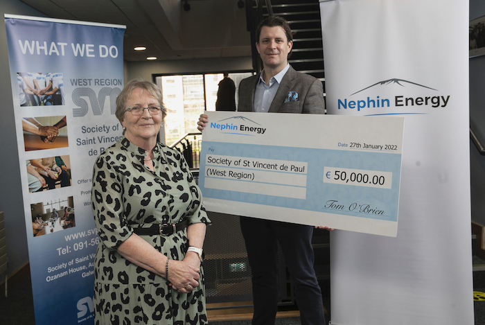Maureen Mitchell is pictured receiving the Nephin Energy donation earlier this year from Tom O’Brien. Photo: Fennell Photography 