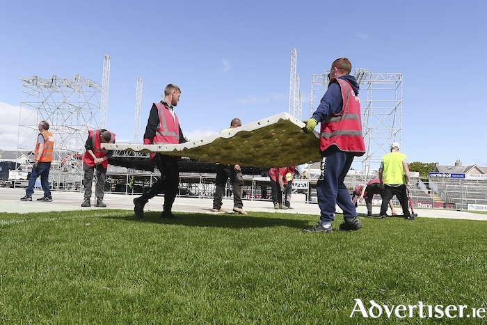 A protective covering is laid on the pitch at Pearse Stadium ahead of Saturday's concert by The Black Eyed Peas.  Photo:- Mike Shaughnessy