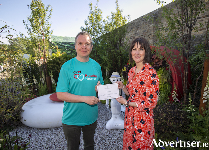 Prof Derek O’Keeffe, Galway garden designer, pictured with Kerrie Gardiner, Bloom showgarden manager, receiving a silver medal for Croí - the Cardiovascular Garden, sponsored by Croí, at Bord Bia Bloom. The celebrated outdoor festival, now in its sixteenth year, took place over the Bank Holiday weekend. 