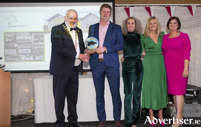 Cathaoirleach Cllr Peter Keaveney presenting one of his awards to Brian Kenny, Jacinta Colohan, Sharon McManus and Colette Brehony of Lawrencetown Community Development Group - Pride of Place