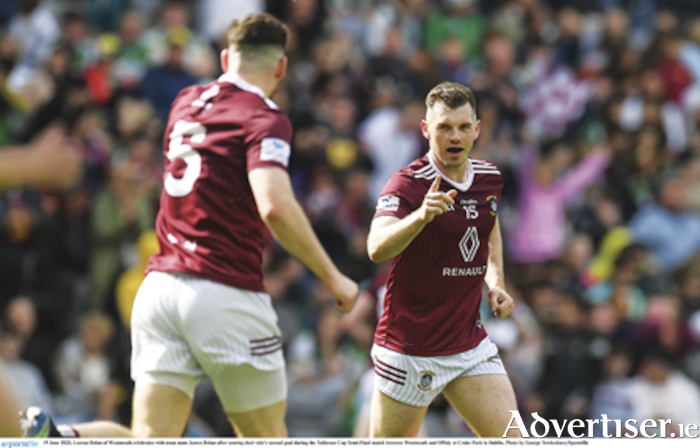 Castledaly club player, Lorcan Dolan celebrates with Garrycastle's James Dolan after scoring Westmeath's second goal during the Tailteann Cup semi-final win over Offaly at Croke Park in Dublin. Photo by George Tewkesbury/Sportsfile