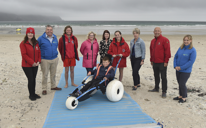 Pictured on Keel Beach on Achill Island  Mayo County Council announced the rollout of four new all-terrain beach wheelchairs and wheelchair friendly beach mats which will greatly enhance accessibility across several Mayo Blue Flag Beaches, were Patricia Flynn, (Acting Water Safety Development Officer, Mayo County Council), Chris McCarthy (Achill Tourism), Jake Morris (Beach Lifeguard), Patsy McNulty (Mayo County Council), Deirdre Finnerty (Mayo County Council Community & Integrated Development), Hannah Grady (Beach Lifeguard), Anna Connor (Tourism Development Officer, Mayo County Council), Charlie Lambert, (Mayo Sports Partnership) and Catherine (Kilbane Achill Tourism). Photo: Conor McKeown