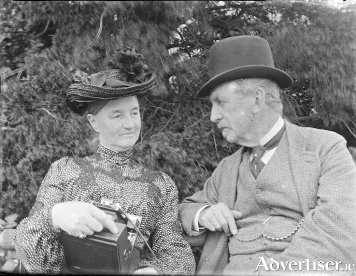 Luke Gerald Dillon, 4th Baron Clonbrock, with his wife Lady Augusta. Note the camera in her hand.