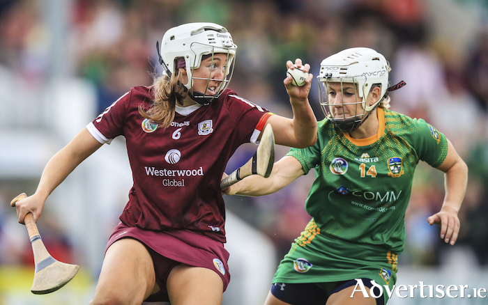 Galway's Lisa Casserly escapes Meath's Jane Dolan in the Glen Dimplex All-Ireland Intermediate Camogie Championship semi-final, Nowlan Park, Kilkenny.
Photo: ©INPHO/Evan Treacy