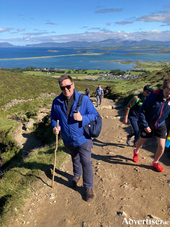 Archbishop of Tuam, Dr Francis Duffy pictured climbing Croagh Patrick on Sunday. Photo: CYMI