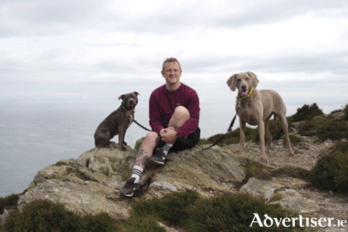 PJ Gallagher with his dogs Wendy and Stella. Photograph: ©Fran Veale
