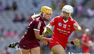 Galway&#039;s Ciara Donohue tries to dispossess Lauren Homan of Cork in the 2022 Glen Dimplex All Ireland Intermediate Camogie final.
Photo: &copy;INPHO/Bryan Keane
