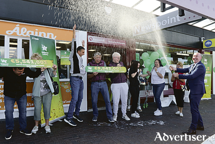 Celebrating selling a winning lottery ticket at Newspoint newsagent, Galway Shopping Centre, are Stephen Dowling, Ina Shearer, Alan Shearer, Conor Donoughue (National Lottery), Billy Shearer ( shop owner), Liam Shearer, Leah Purcell, Denise Purcell, Karen Shearer and Maureen Connnell.  Photo: Iain McDonald / Mac Innes Photography