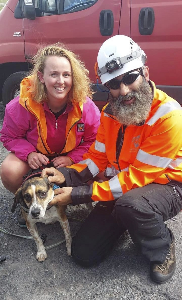 Barry reunited with his owner and a member of the Achill Coast Guard team following his rescue. Photo: Achill Coast Guard/Facebook. 