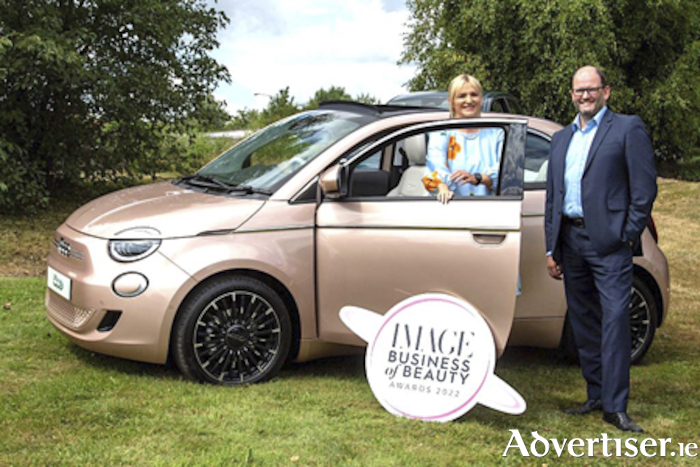 Melanie Morris, Image contributing editor and John Saunders, managing director at Fiat Ireland, with the FIAT 500 Electric
