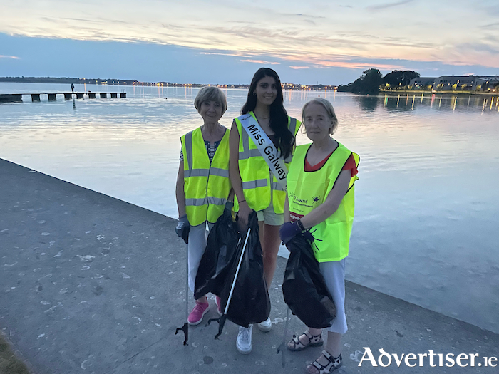 Miss Galway Ava Mathews pictured with Rita O'Malley and Marty Nix of the Loghrea Tidy Towns Committee at Loughrea Lake in Loughrea Co Galway at the nationwide beach and waterways clean-up co-ordinated by the finalists of Miss Ireland 2022.