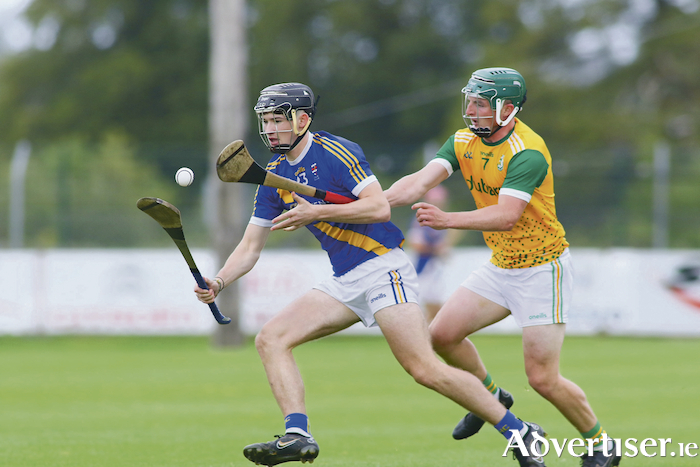 Loughrea's Darren Shaughnessy comes under pressure from Craughwell's Mark Monaghan in action from the Brooks Senior Hurling Championship game at Kenny Park, Athenry on Saturday.  Photo:- Mike Shaughnessy
