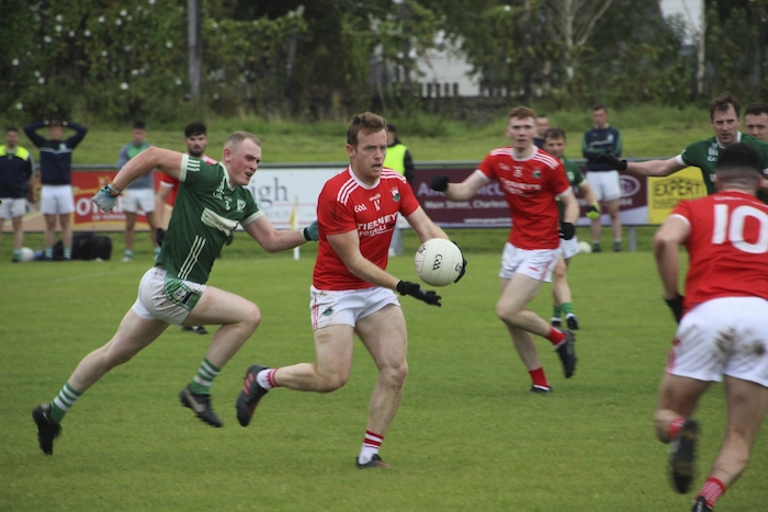 Passing it off: Garrymore's Trevor Nally passes the ball against Charlestown last weekend. Photo: Mayo GAA 