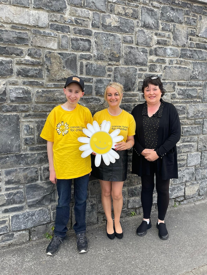 Mary McHugh Murphy, the new Connacht Regional Fundraiser for Cancer Fund for Children (centre), pictured with charity supporters Jack Walsh and his mother Majella