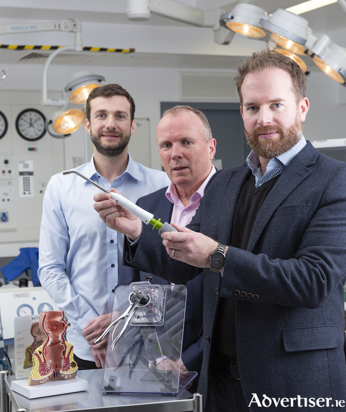 (L-R) Moshe Zilversmit, co-founder and CEO with Signum Surgical scientific advisory board member Mark Regan, Consultant Colorectal Surgeon at University Hospital Galway; and Eoin Bambury, co-founder and chief technology officer who is pictured holding the BioHealx Technology.