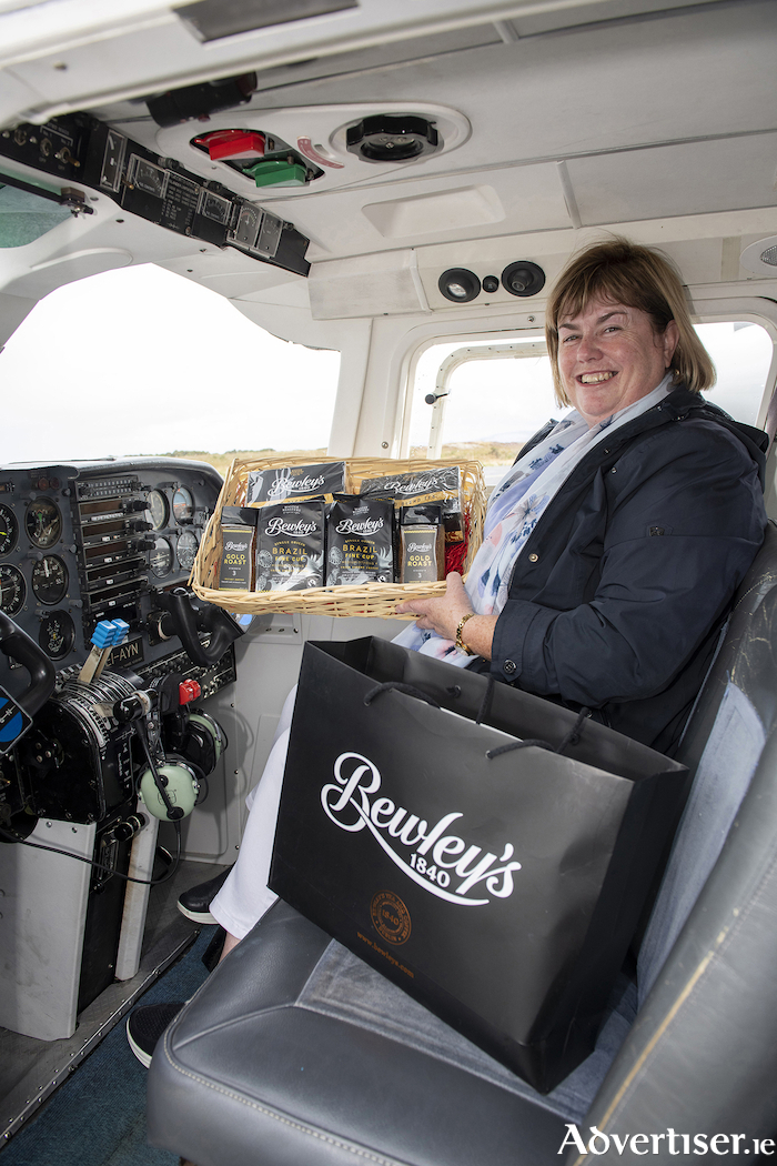Catherine Mulkerrin on the way home to Inis Mór from the Galway mainland via Aer Arann. She has been running Bewley’s Hospice coffee mornings for over 20 years. 