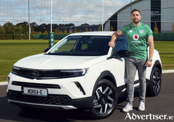 Ireland's Jack Conan with his new Opel Mokka-e boasts plenty of room for all his rugby kit.