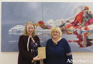 Miriam Mulrennan, Westmeath Arts Officer is pictured in the Luan Gallery with Athlone poet, Jackie Gorman.  Jackie read a sequence of 12 poems from a limited edition book which has been produced by All Around The Sun and will be available in September