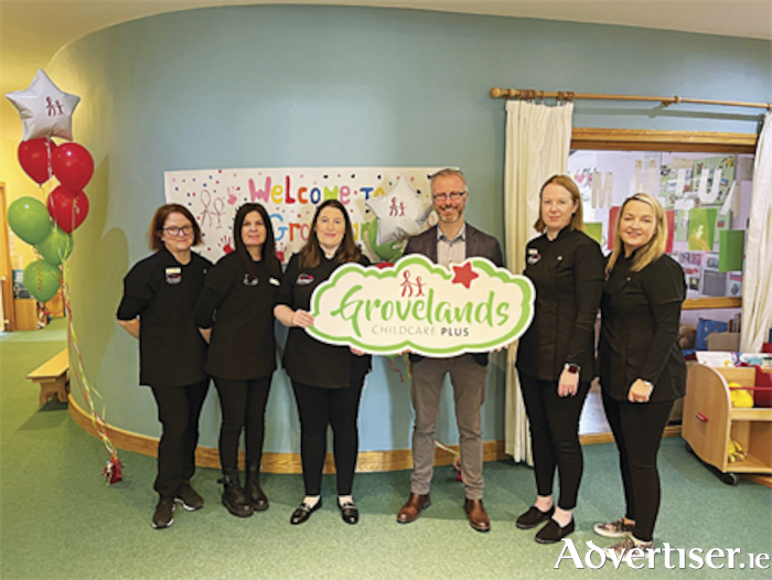 Minister Roderic O’Gorman is pictured with staff members from Grovelands Childcare during a recent visit to their centre in the IDA Business Park in Athlone