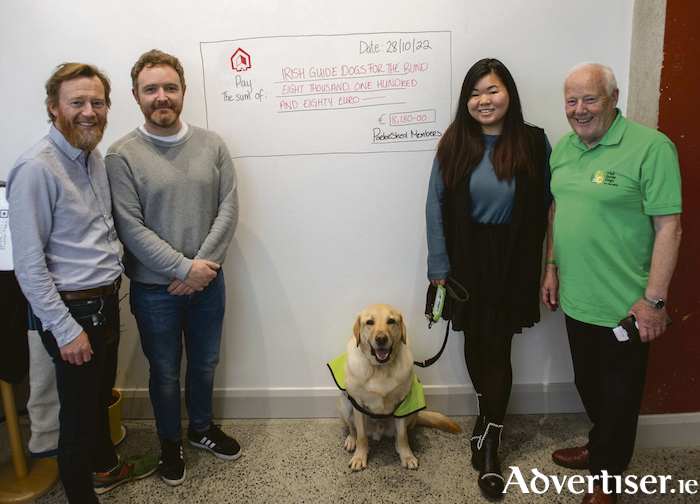 Pictured at the presentation of the cheque were Andrew Downes; PorterShed community member Barry Gilhooly; Portershed Office Manager Aoife Cheung and Frank Downes of Irish Guide Dogs.