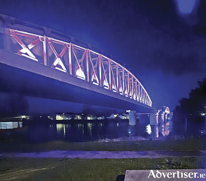 The Rotary Club of Athlone celebrated World Polio Day on Monday, October 24 and to mark the occasion the White Bridge, which traverses the River Shannon in the heart of the town was illuminated in the colour purple by Iarnrod Eireann.
