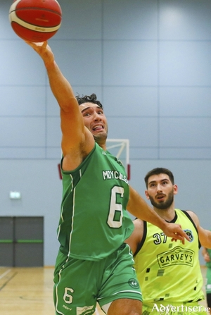 Looking to upset the odds: Moycullen&#039;s Grant Olsson on his way to shot,  watched by Matija Jokic of Garvey&#039;s Tralee Warriors in action from the InsureMyVan.ie Superleague game at Kingfisher on Saturday. Photo:- Mike Shaughnessy