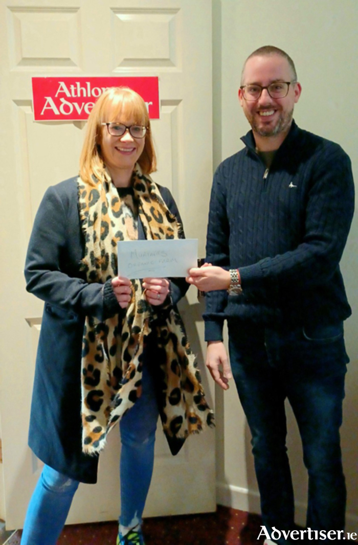 Carol Glynn from Ballinasloe was the recent winner of a family pass for two adults and two children to Christmas Wonderland at Murtagh’s Organic Farm.  She is pictured receiving her prize from Athlone Advertiser Advertising Manager, Dan Power