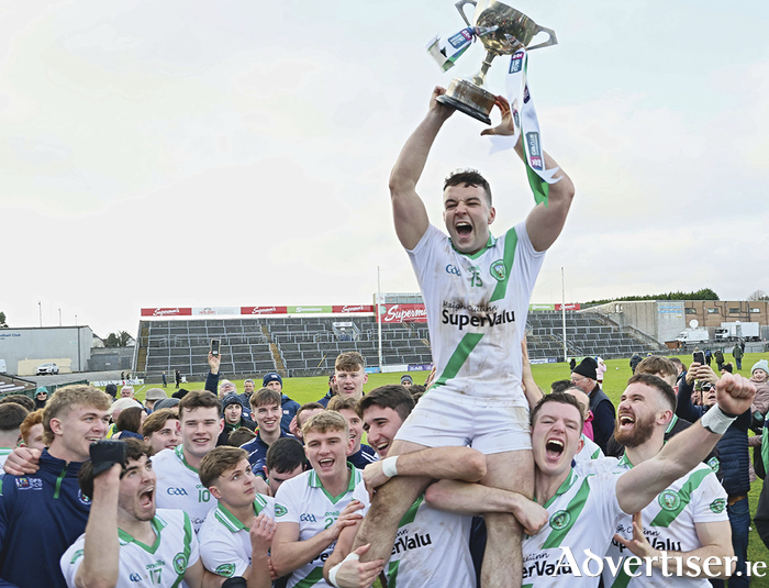 Top: Maigh Cuilinn captain Dessie Conneely lifts the Shane McGettigan Cup his side defeated Tourlestrane in the AIB Connacht GAA Senior Football Club Final in Pearse Stadium on Sunday. Photo: Mike Shaughnessy