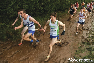Paddy Noonan of Craughwell AC (right) racing through the mud at the National Novice event for Craughwell AC, silver team medalists at the event. 
