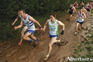 Paddy Noonan of Craughwell AC (right) racing through the mud at the National Novice event for Craughwell AC, silver team medalists at the event. 
