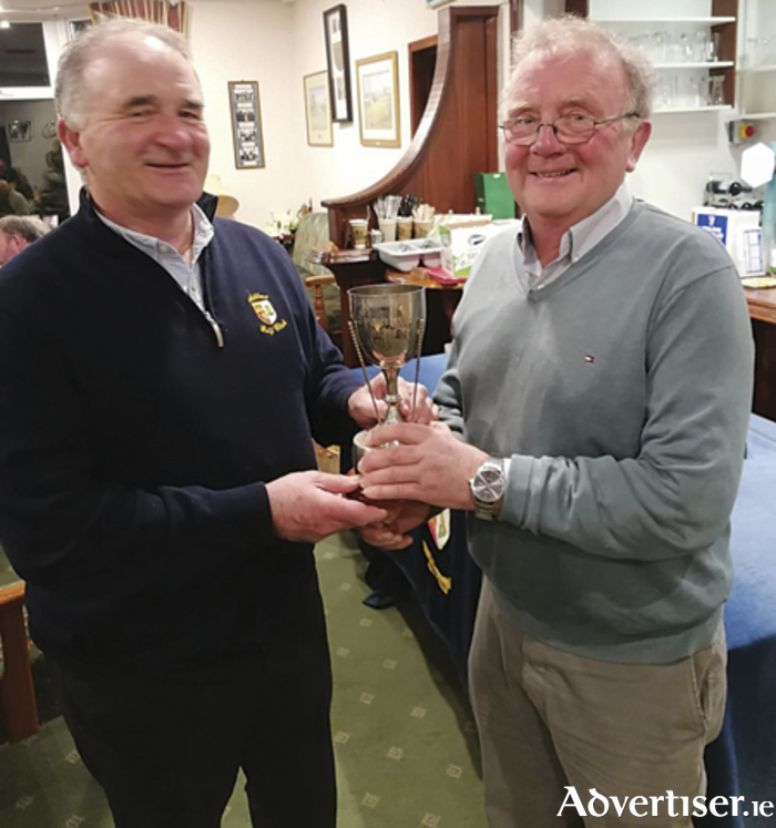 Michael Cuddy of Cuddy & Co who sponsored ‘The Plumber of the Year’ trophy, presents the trophy to John Fagan, Plumber of the Year 2022.
