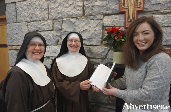 On right is author Bronagh Mc Shane pictured presenting a copy of her book to Sr Bonaventure and Sr Colette of the Galway Poor Clare Community 

