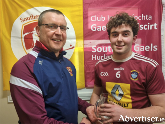 Southern Gaels ‘Young Player of the Year’ 2022, Ciaran Geary, is presented with his award by Tony O’Keeffe