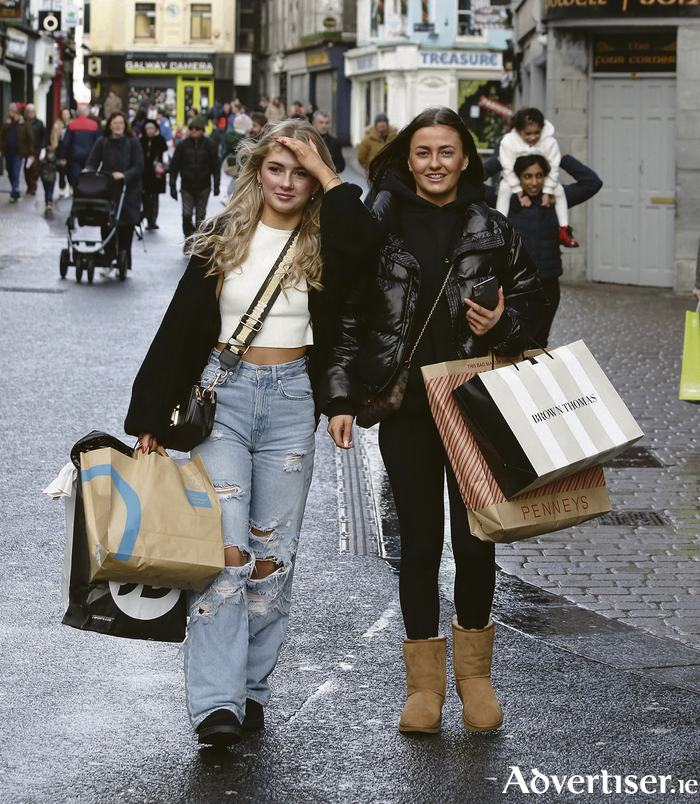 Shauna Divilly (left) and Abbi Oliver from the Claddagh while shopping during the sales in the city centre on St Stephen’s day.