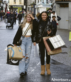 Shauna Divilly (left) and Abbi Oliver from the Claddagh while shopping during the sales in the city centre on St Stephen&rsquo;s day.