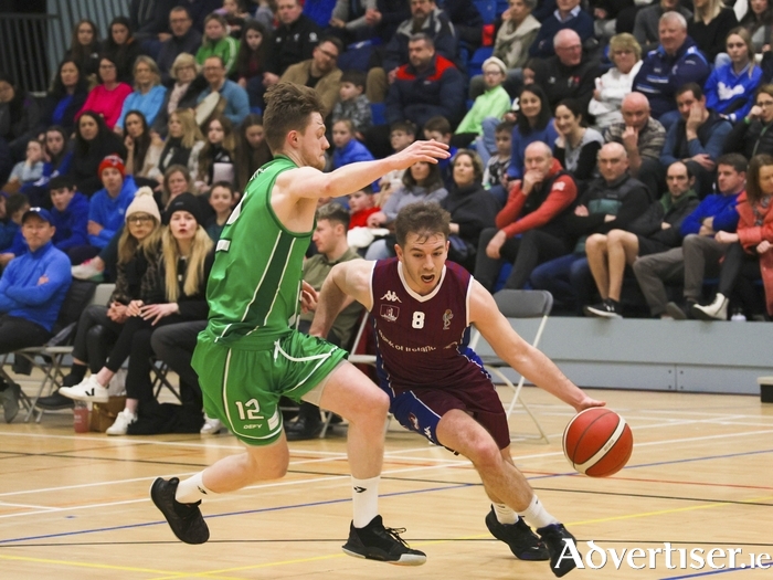 Moycullen's Kyle Cunningham attempts to block University of Galway Maree's Stephen Commins  in action from the Basketball Ireland InSureMyVan.ie Mens Superleague game at University of Galway Kingfisher on Saturday. Photo:- Mike Shaughnessy