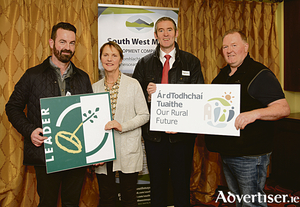 Sean Carolan, Breege Joyce, Declan Holmes and Michael Callaghan attending a Leader community consultation meeting.