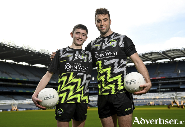 Aaron Graham of Whitehall Colmcille with John West Féile 2023 Ambassador Paul Conroy of Galway at Croke Park. 
 Photo: David Fitzgerald/Sportsfile.