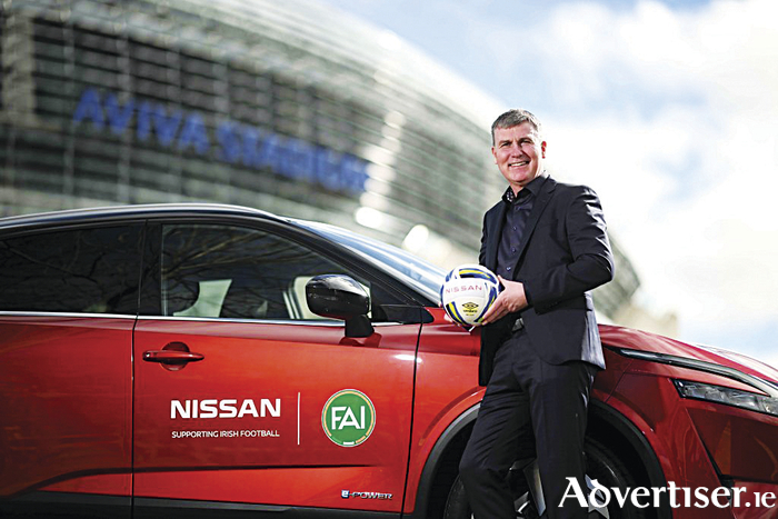 Republic of Ireland manager Stephen Kenny with a new Nissan which helps the FAI became more sustainable.  Photo Stephen McCarthy/Sportsfile.