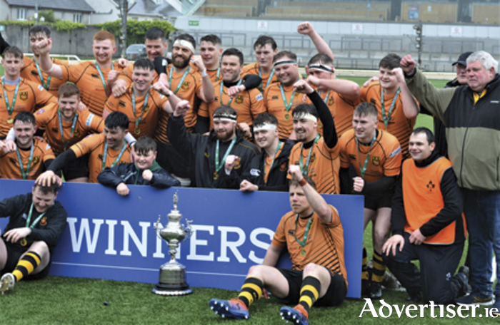 The Buccaneers players are pictured in jovial spirits following their Connacht Senior Cup success over Sligo this past weekend