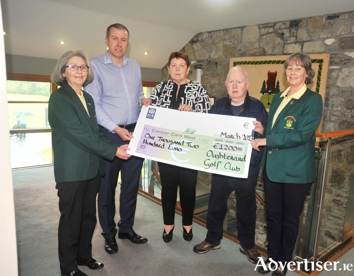 Pictured at the presentation of a cheque for €1200 to Richard Flaherty ( Cancer Care West ) are Kay Lydon ( President of Oughterard golf club ) and Ita Green ( Lady Captain ) , Paraic Connell ( office administrator, OGC ), and Peggy May Keane, who supplied at the card game held in February in aid of Cancer Care West, at the golf club.