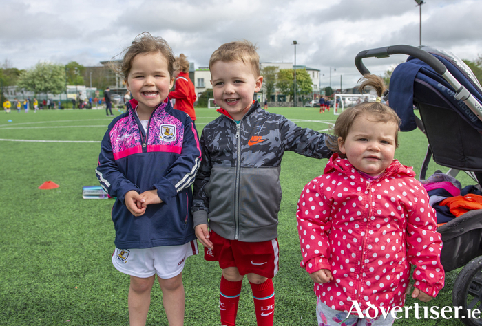 Holly Ryan, David Donohue and Jean Ryan from Athenry enjoying the Soccer at the Maree Oranmore FC St. Columba's Credit Union Finals Day 2023 on Sunday. Photo : Murtography