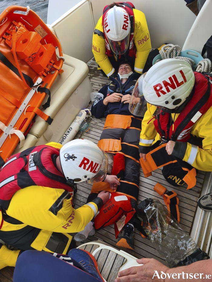 Galway RNLI volunteer crew, from left: Frank Leonard, Stefanie Carr and Olivia Byrne assessing and stabilising a ‘patient’, Sean McLoughlin, who is also an RNLI crew member. The crew were observed by Professor Aidan Devitt, Consultant Orthopaedic Surgeon and Mr Mike Smith, Senior Technical Officer Skills and Simulation, College of Medicine, Nursing and Health Sciences, University of Galway as part of a trauma simulation exercise.
