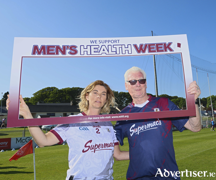 Anna Ryan, Galway GAA health and wellbeing committee member, with Tex Callanan, Galway Senior Hurling team kit man, supporting Men's Health Week. International Men's Health Week (MHW) always begins on the Monday before Father's Day and ends on Father's Day itself. Mens Health Week is celebrated in many European countries, as well as in the USA, Australia, New Zealand, Canada and several other places worldwide. Photo: Mike Shaughnessy/GalwayPix.ie.