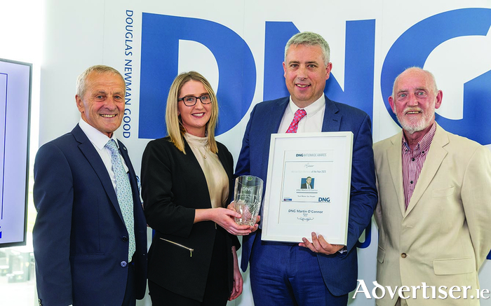 Local agent DNG Martin O'Connor Auctioneers scoops DNG Marketer of Year Award.  Pictured are Tony Forte (DNG franchise director), Emily Walsh (DNG Martin O'Connor Auctioneers ), Martin O'Connor (DNG Martin O'Connor Auctioneers) and  Nigel Millar (Millar Signs).