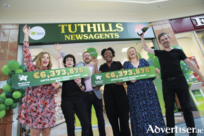 Pictured l-r, Sara Orr, National Lottery PR, Bernie Coen, Tuthills, Simon Reenan, Regional Manager, National Lottery, ticket seller Abigail Kamphambale, Tuthills, Donna Broderick, National Lottery Sales Rep and Joe Callinan, manager, Tuthills, Golden Island Shopping Centre.
