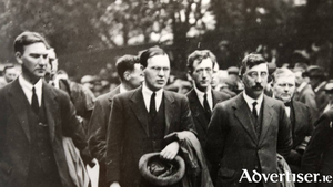 Ernest Blythe, hat in hand pictured at Micheal Collins funeral, believed an all-Irish Galway University would lead the way for the revival of a Gaelic speaking Ireland.