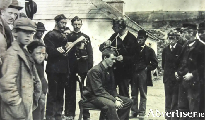 Academics measuring the heads of people on Inishbofin in 1892. It was believed at the time that the islanders were Ireland’s Indigenous people. Photograph: Trinity College Dublin