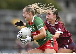 Driving into the semi-finals: Tara Needham in action against Aoife Molloy of Galway during the TG4 Ladies Football All-Ireland Senior Championship quarter-final match between Galway and Mayo. Photo: Sportsfile 